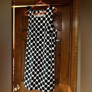 Knee length polka dot dress. Zipper in the back. Gap size Large